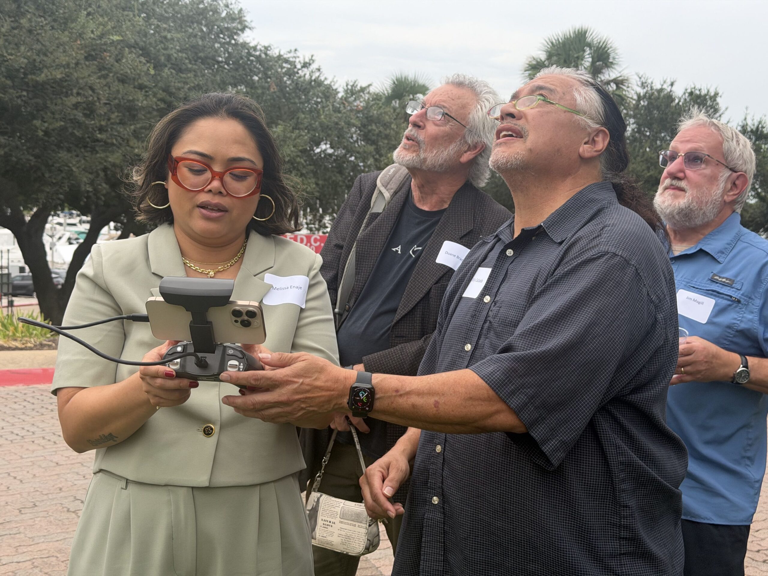 Alex Hoben/SPJFW SPJ members gathered for a drone demonstration by Alicia and Billy Calzada, who led a conference session on drone photojournalism and its intersection with Texas privacy laws.